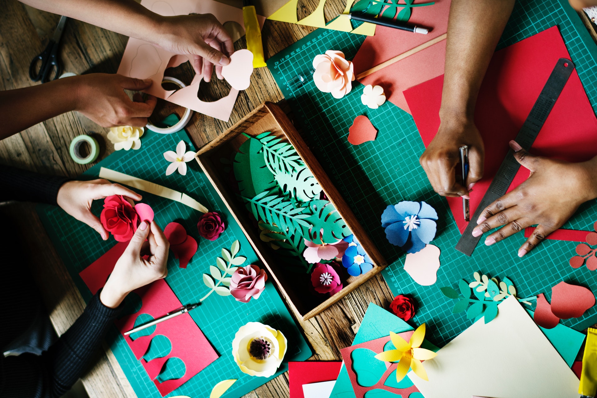 Moms doing craft during a moms night out.