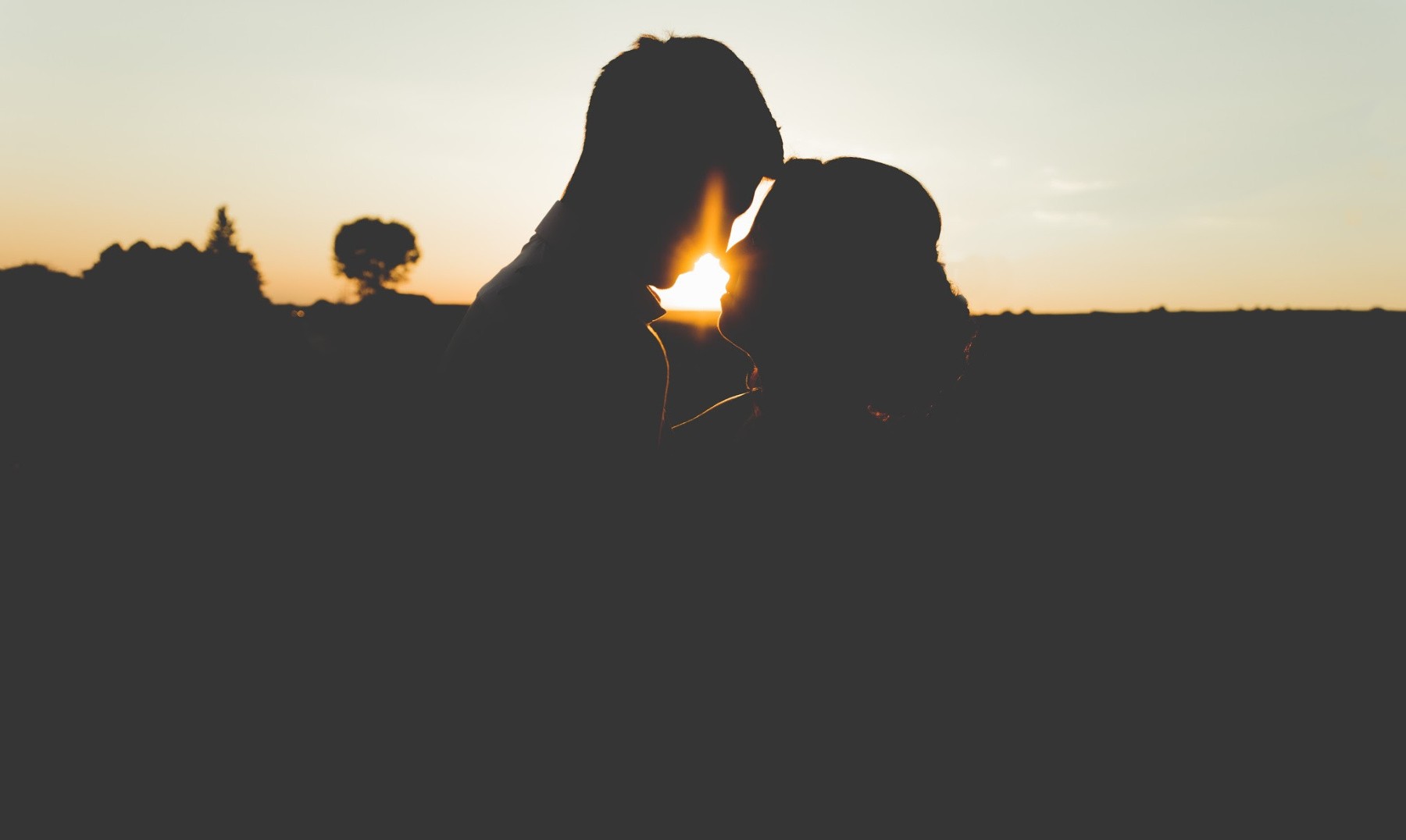 Romantic Quotes couple at sunset